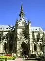 Gothic church with a tall spire and pointed arches